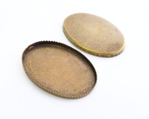画像1: カンなし皿/メタル/40×30mmオーバル/金古美(1個)