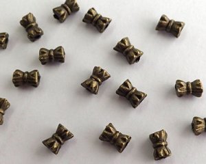 画像1: メタルビーズ/ミニリボン/金古美/約5×4mm（10個）